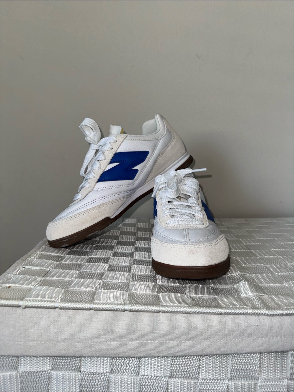 New Balance White Sneakers with Blue 'N' Accent